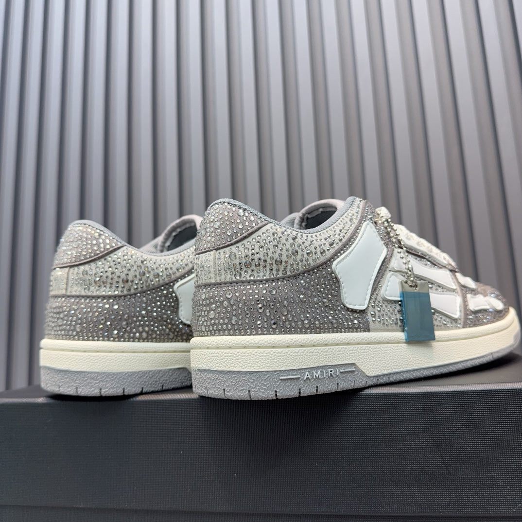 Back and side view of silver glitter sneaker with white heel tab and lace-up closure