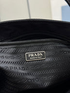 Prada interior label on dark lining with PRADA and MADE IN ITALY text
