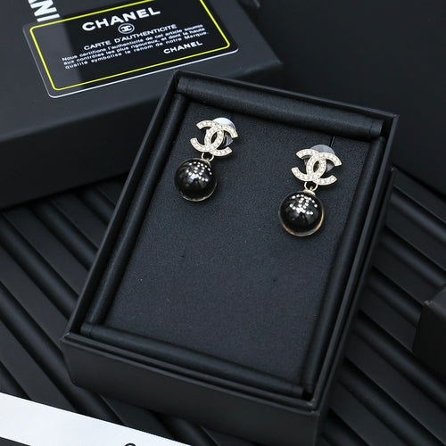 Chanel drop earrings with silver-tone CC logo and black ball beads