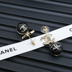 Chanel stud earrings with black sphere beads and silver-tone CC charms