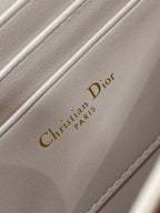 Christian Dior Paris embossed on pale pink inner lining with stitching