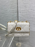 Dior handbag with quilted white finish, gold CD clasp, and shoulder chain strap