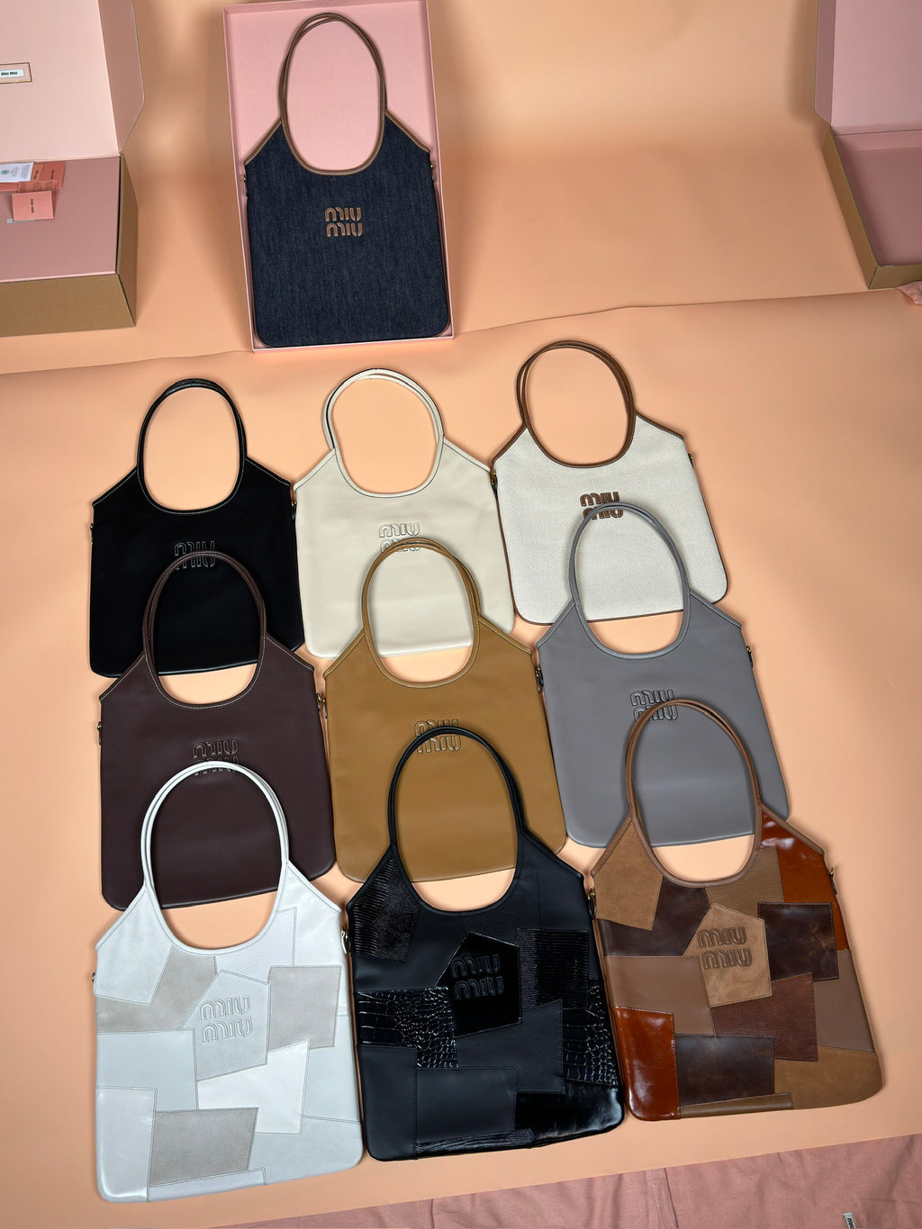 Assorted Miu Miu mini totes with logo, in dark, light, and brown colorways