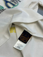 White T-shirt collar with attached interior label tag