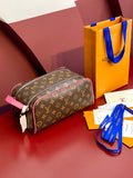 Louis Vuitton monogram toiletry bag with pink trim and top zipper closure