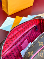 Louis Vuitton monogram toiletry bag interior pocket with pink lining detail