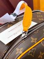 Louis Vuitton monogram toiletry bag top zipper with yellow leather strap