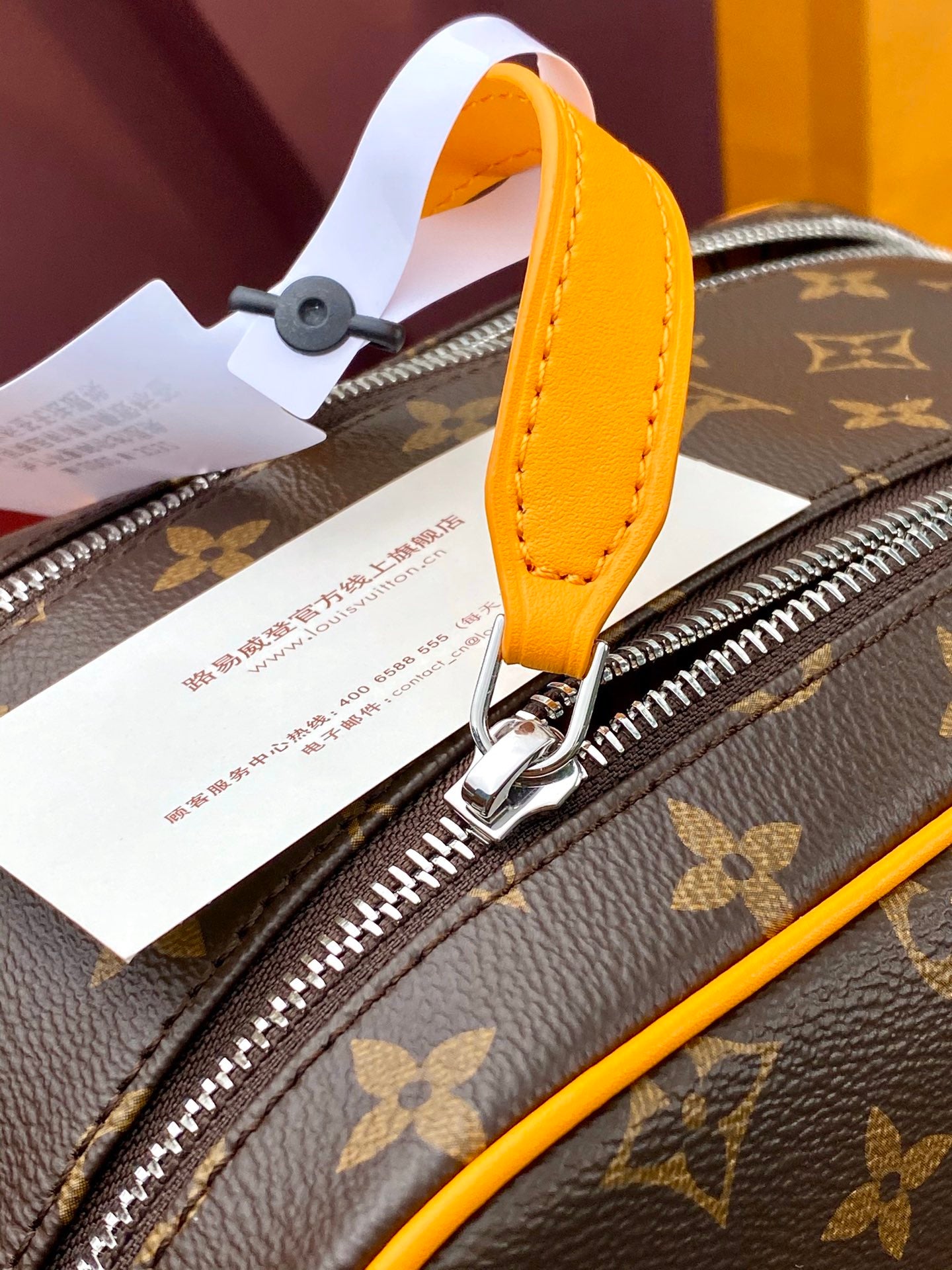 Louis Vuitton monogram toiletry bag top zipper with yellow leather strap