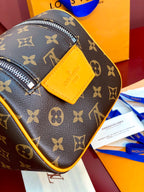 Louis Vuitton monogram toiletry bag with yellow leather patch and zip front