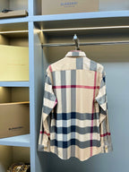 Burberry plaid button-up shirt back view with long sleeves and curved hem
