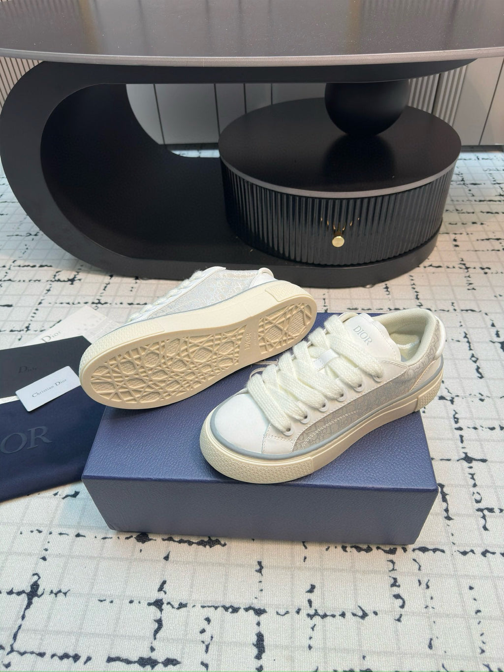 Dior unisex sneakers, white leather, tread outsole and toe view