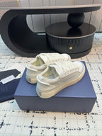 Dior unisex lace-up sneakers, white leather, angled view of uppers