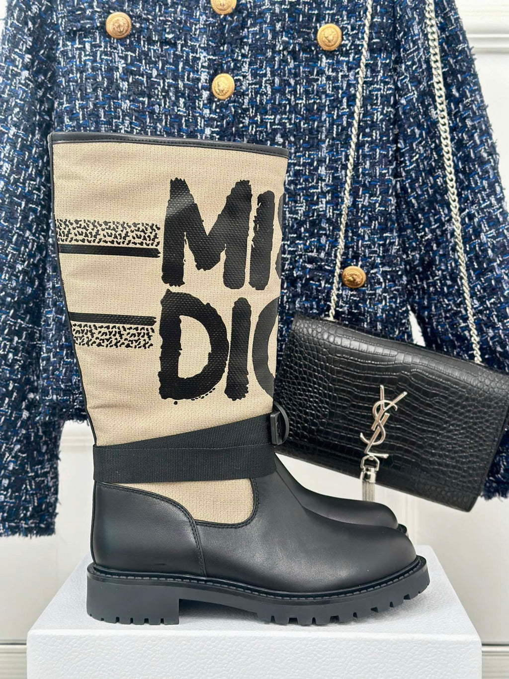 Dior ladies ankle boots with black leather uppers and cream logo shaft