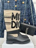 Dior ladies ankle boots with black leather uppers and cream logo shaft