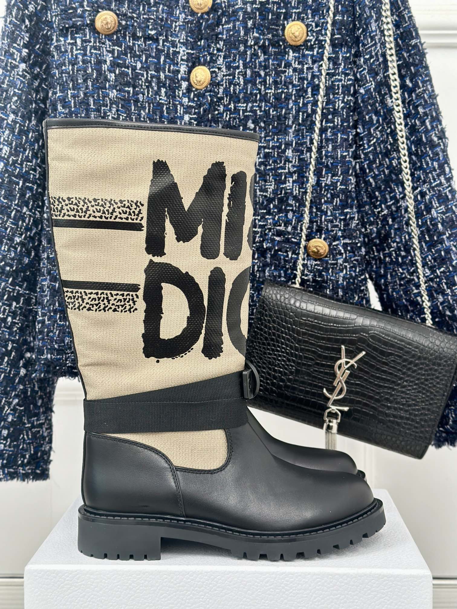 Dior ladies ankle boots with black leather uppers and cream logo shaft