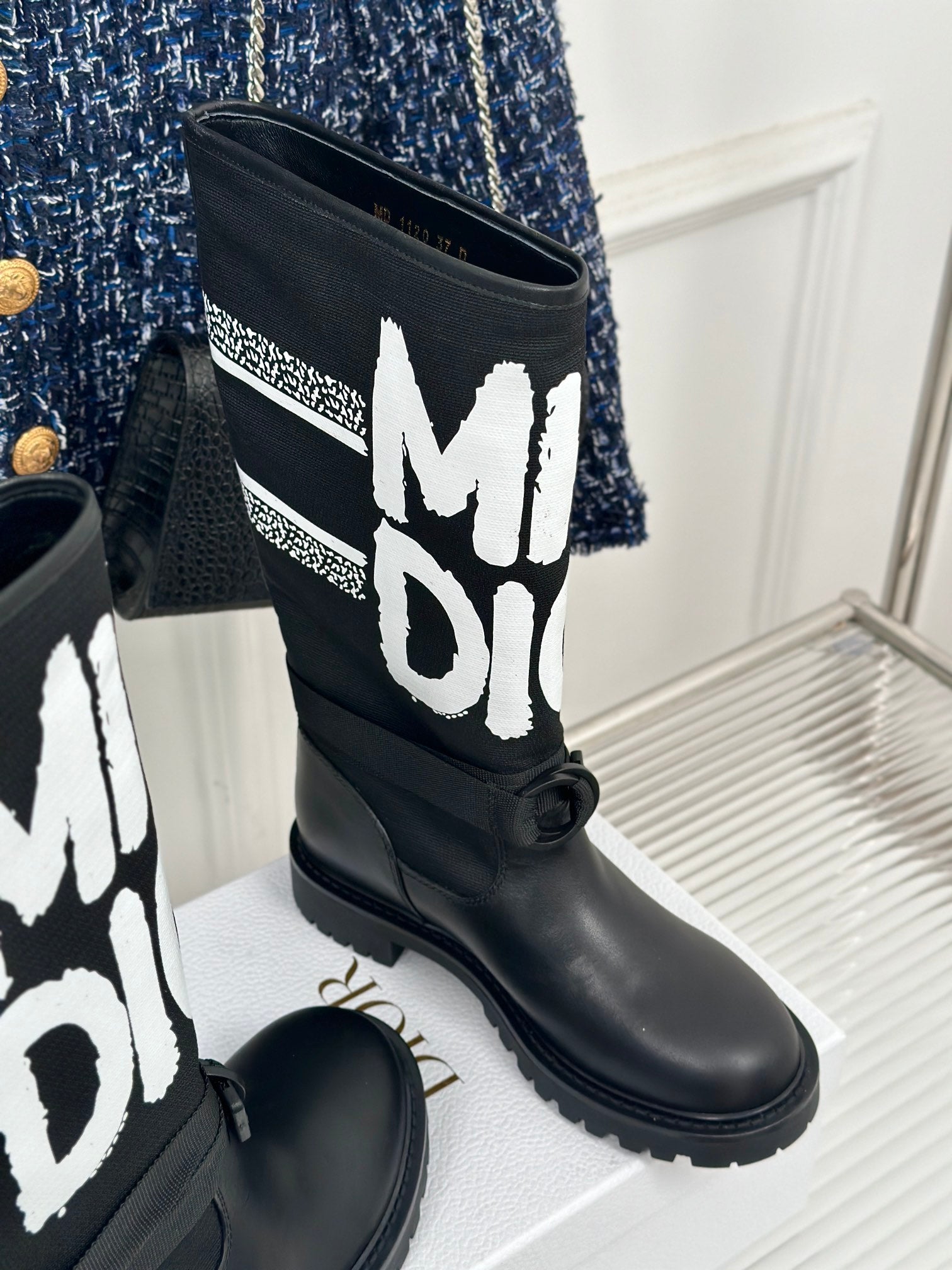 Black Dior logo mid-calf boots with braided lace detail and logo shaft