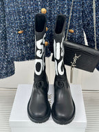Black Dior logo mid-calf boots with gold YSL detail on the side and lace-up strap