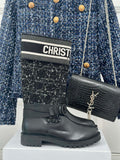 Black ankle boots with tweed shaft and Christan Dior logo strap detail