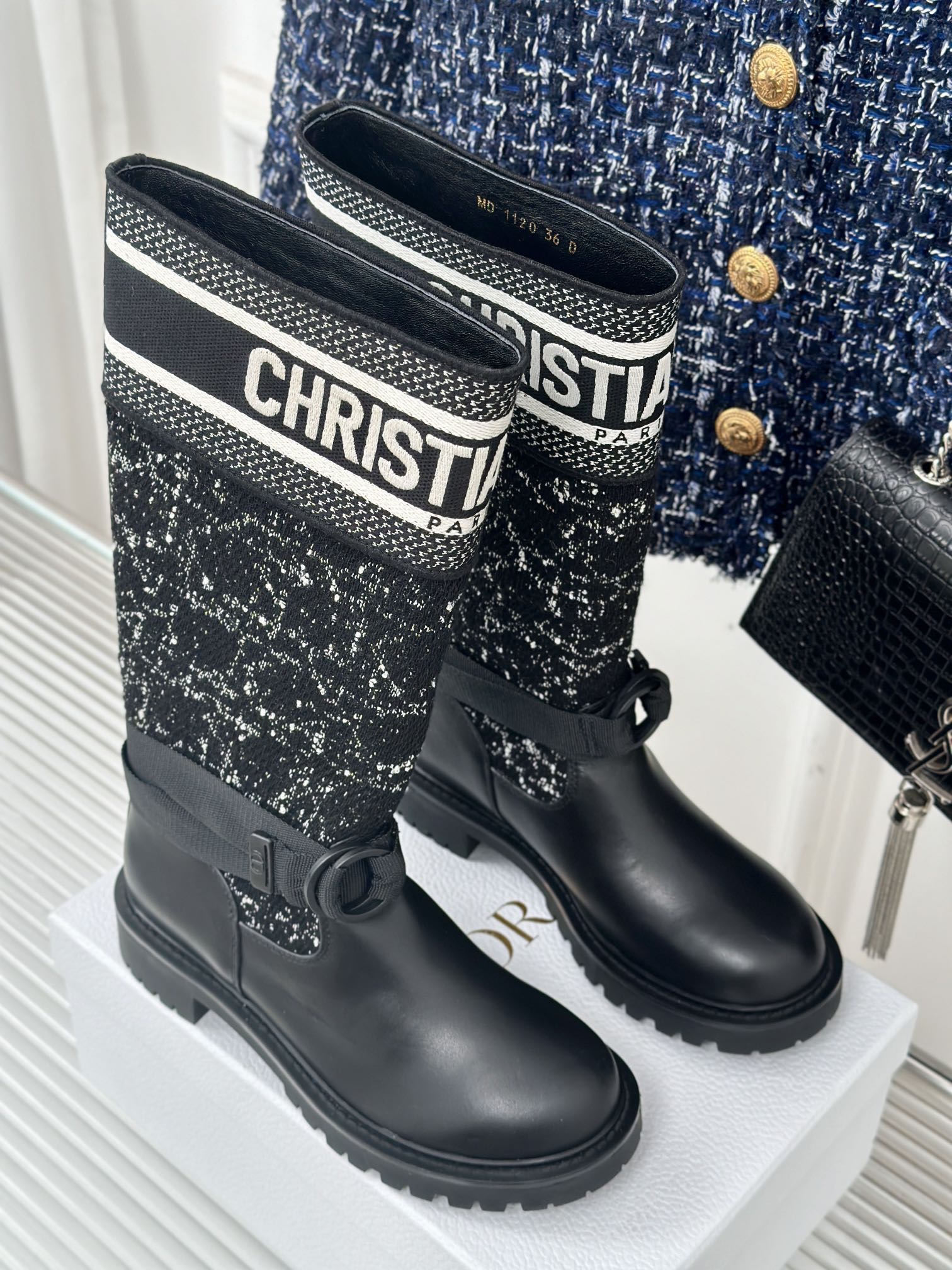 Black boots with patterned fabric uppers, bow tie at side, Dior logo trim