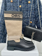 Women’s Dior ankle boots with beige shaft and black leather, logo band and buckle strap