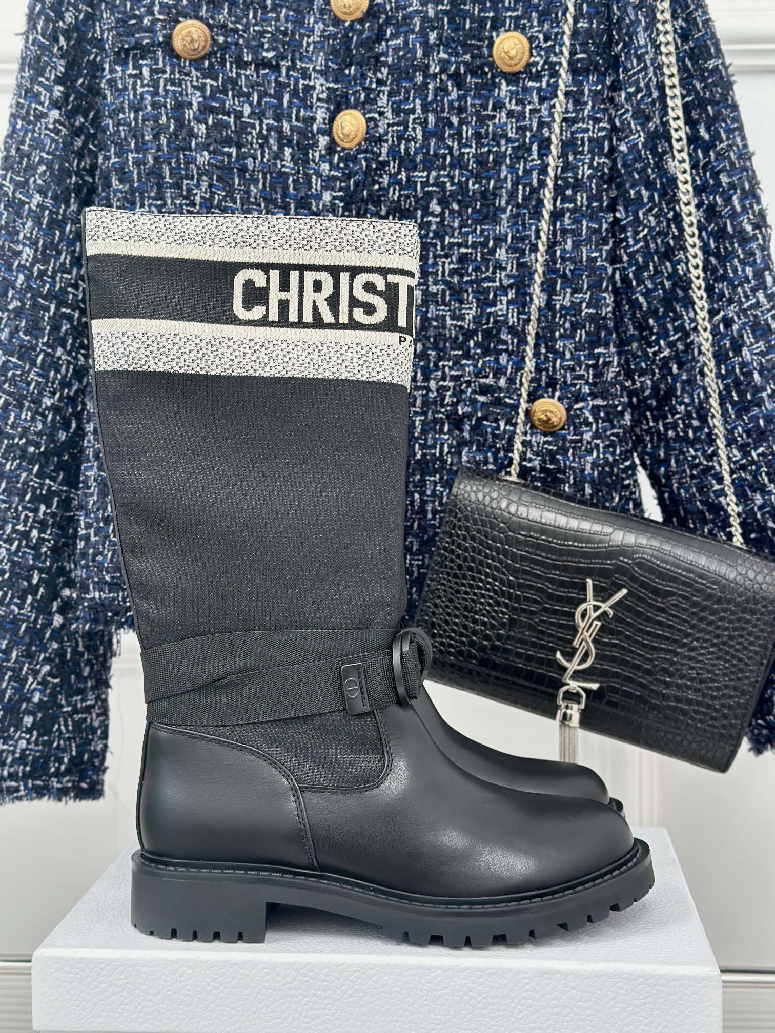 Black ankle boots with logo cuff and buckle strap
