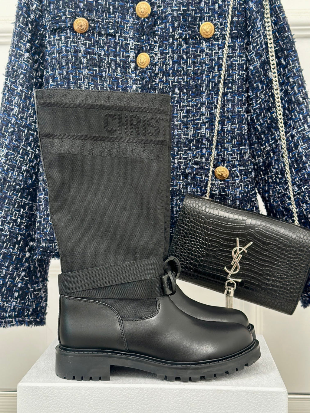 Dior ladies black leather ankle boots with side pull tabs and buckle strap