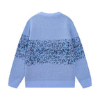 Light blue knit sweater back with speckled AMIRI logo, crew neck
