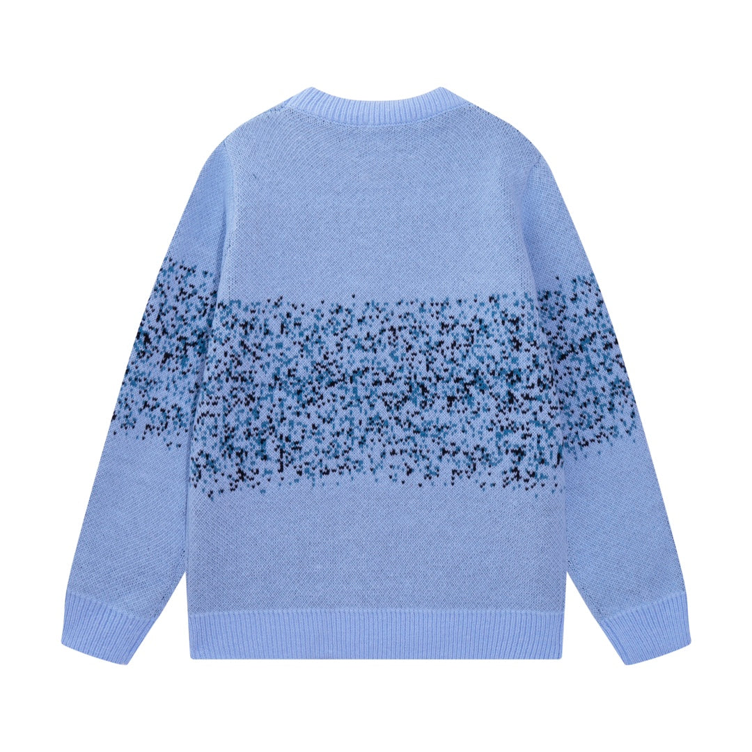 Light blue knit sweater back with speckled AMIRI logo, crew neck