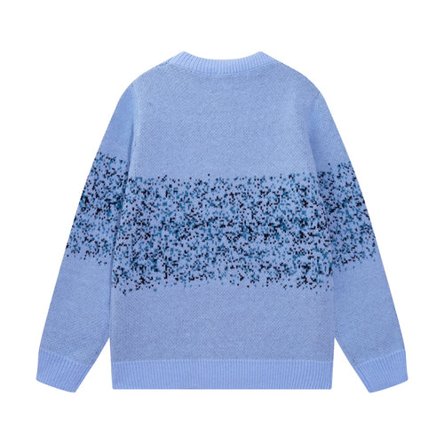 Light blue knit sweater back with speckled AMIRI logo, crew neck