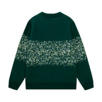 Green knit sweater with speckled AMIRI-style stripe graphic on back