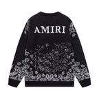 Amiri black knit sweater with AMIRI lettering and jacquard pattern across the back