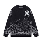 Amiri black knit sweater with crest logo and jacquard pattern on chest and sleeves