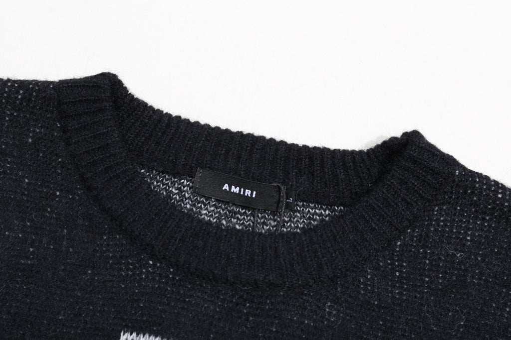 Amiri knit sweater collar close-up with interior brand label