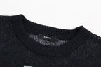 Amiri knit sweater collar close-up with interior brand label