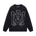 Amiri knit sweater in dark knit with large white graphic on the front