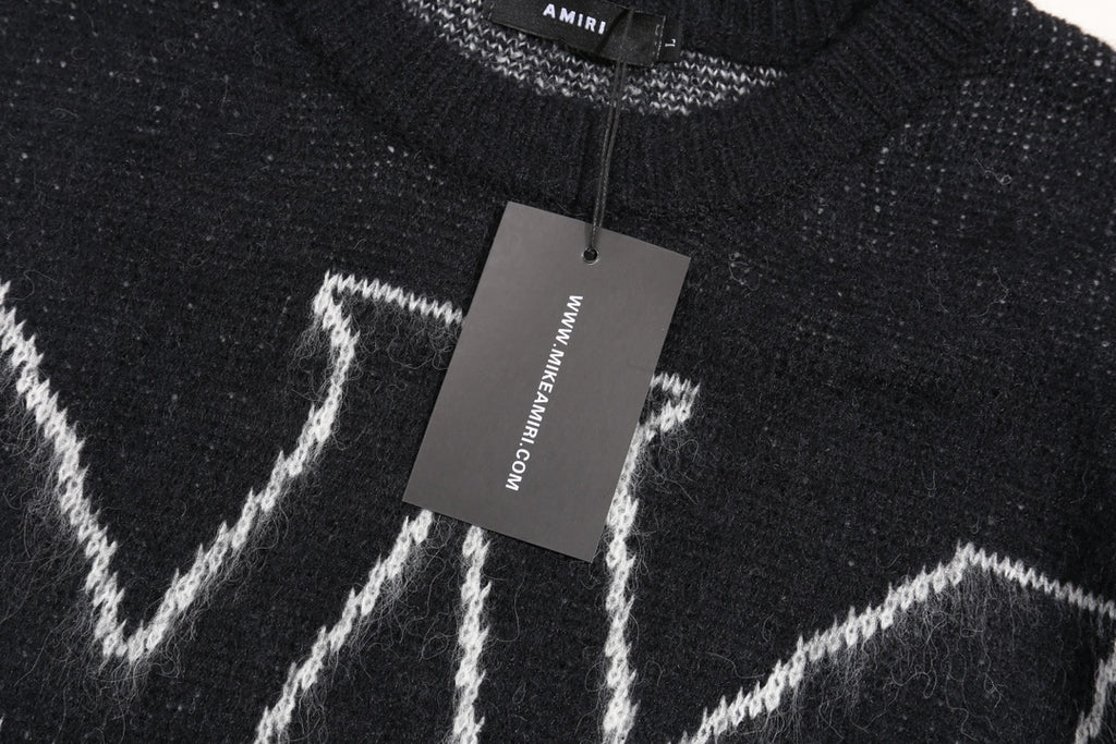 Amiri knit sweater with hanging tag and white zigzag pattern detail