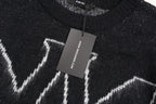 Amiri knit sweater with hanging tag and white zigzag pattern detail