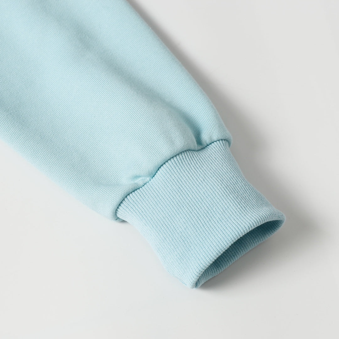 Light blue sweatshirt sleeve end with ribbed cuff