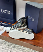 Dior high-top sneakers with black-and-white monogram upper, white outsole detail