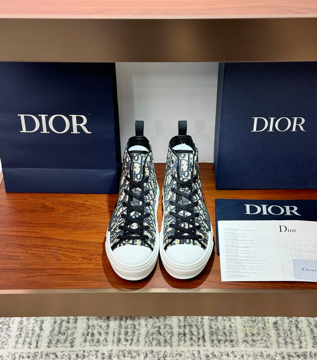 Dior high-top sneakers with black-and-white monogram canvas, lace-up front