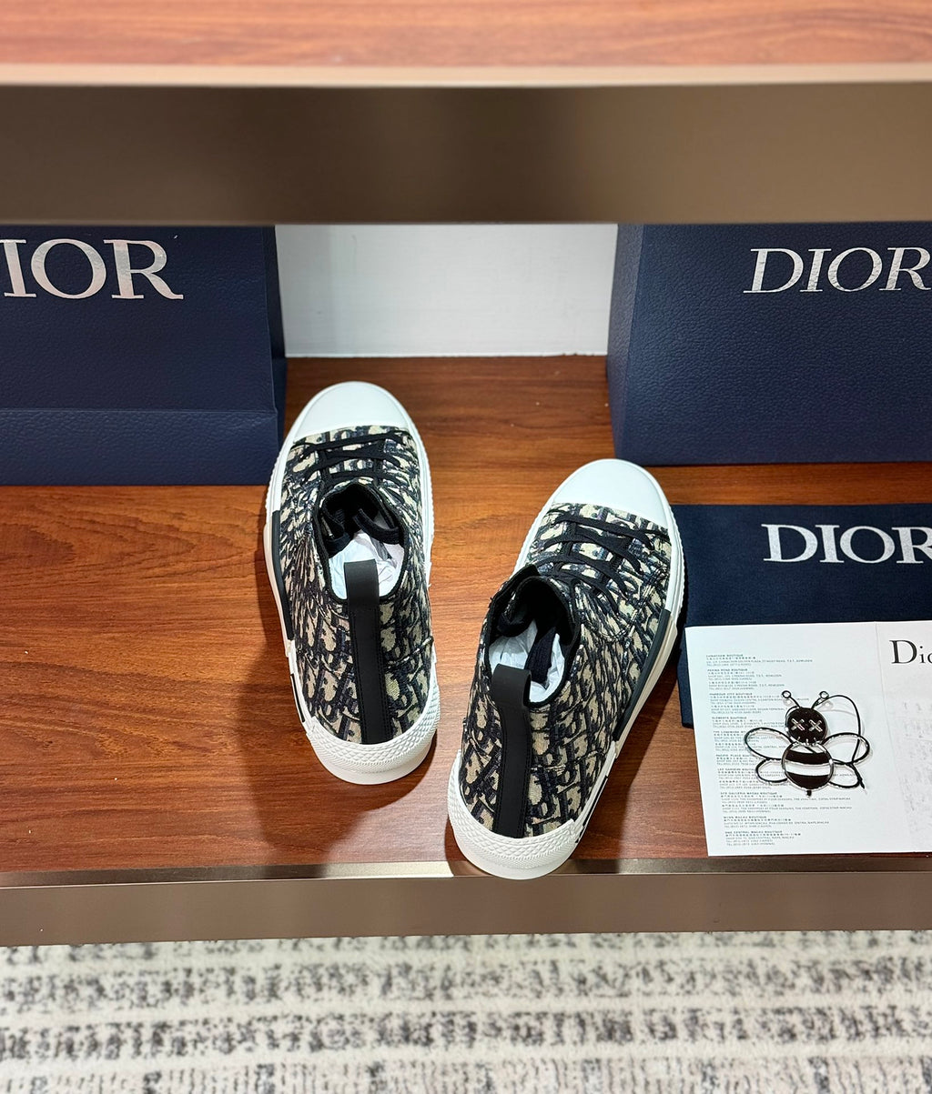 Dior high-top sneakers, patterned black-and-white upper, padded collar