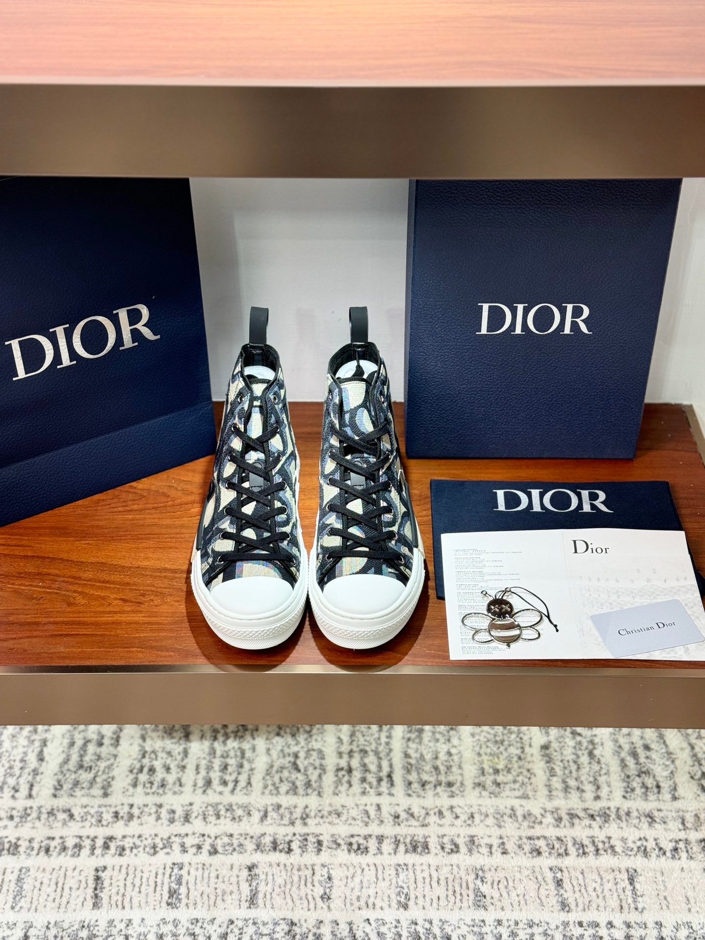 Dior ladies high-top sneakers with black-and-beige monogram pattern, black laces