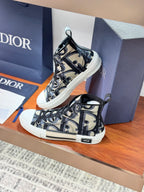 Dior ladies high-top sneakers, close side angle, black-and-beige patterned canvas