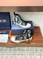 Dior ladies high-top sneakers on box, black-and-beige monogram canvas, lace-up design