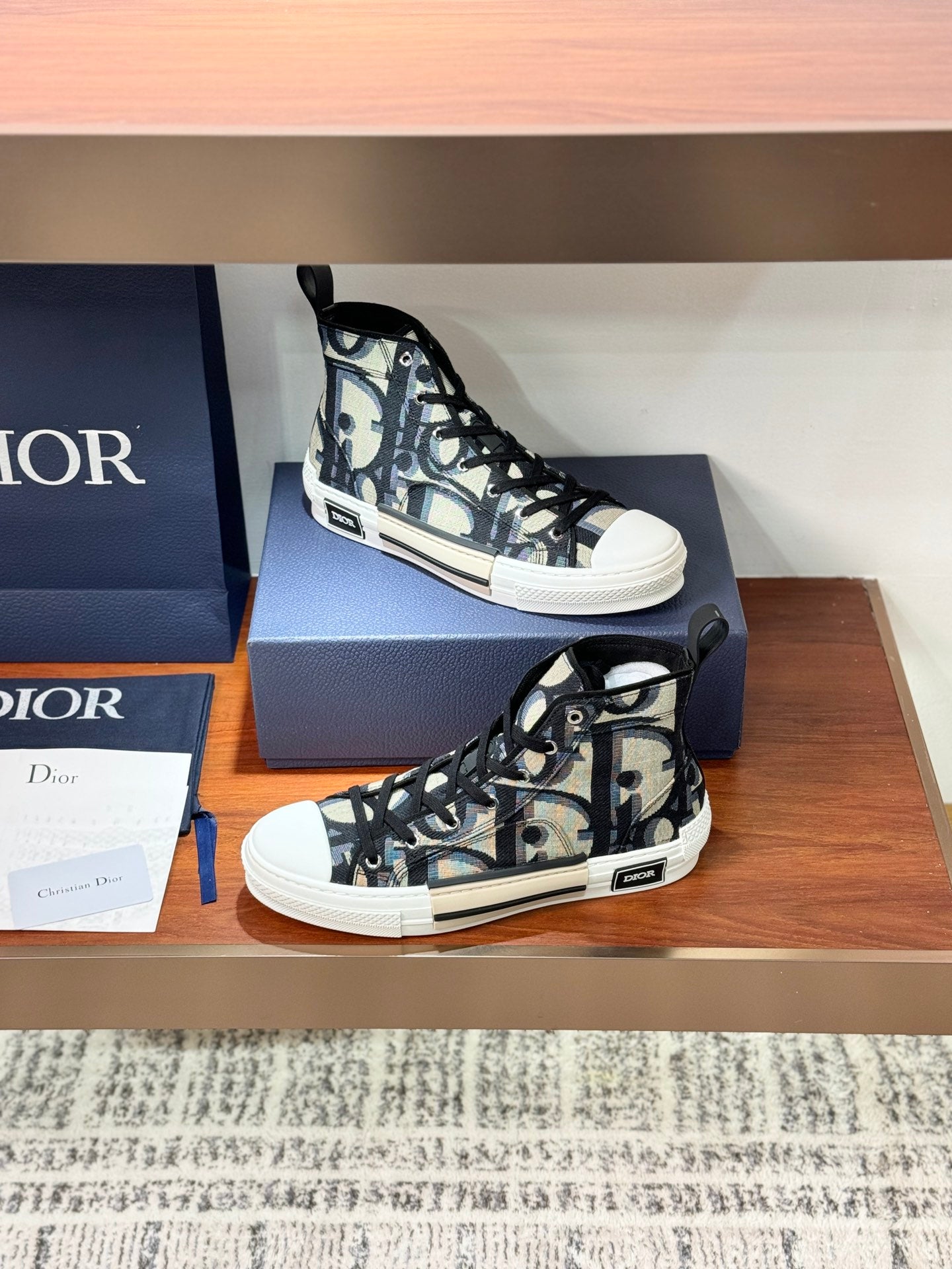 Dior ladies high-top sneakers on box, black-and-beige monogram canvas, lace-up design