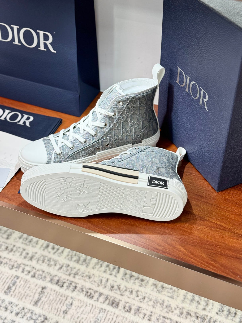 Women's high-top sneakers with patterned upper and visible outsole, gray-blue and white