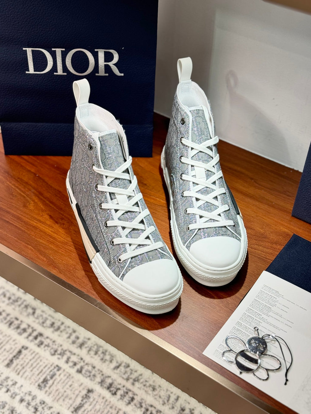 Women's patterned high-top sneakers with white laces and contrast white toe edge
