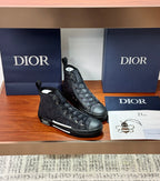 Dior ladies high-top sneakers with dark patterned upper, lace-up style, white trim sole