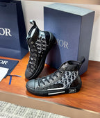 Women’s high-top sneakers with Dior monogram panels, close side profile