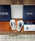Dior ladies high-top sneakers, white with black monogram print and lace-up opening